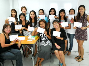 Level 1 'English for Thais' students with certificates