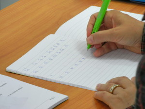 Practising writing Thai script at PLS