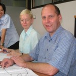Thai teacher K. Tin with two students enrolled in Patong Language School's Thai foundation course