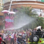 Water spraying on a crowd in Patong, Phuket 5 minutes from Patong Language School