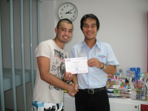 Thai student Ricardo and his language instructor Boyd