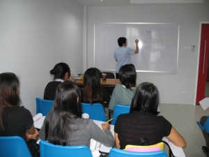Khun Tin teaches beginning English class at Patong Language School in Phuket, Thailand